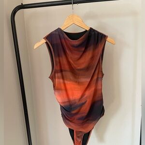 Shein 
Size Med. 
Orange bodysuit